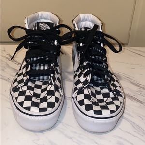 Size 6.5, black and white checkered, platform vans.